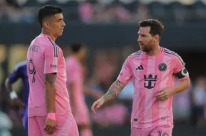 Luis Suárez 跟 Messi